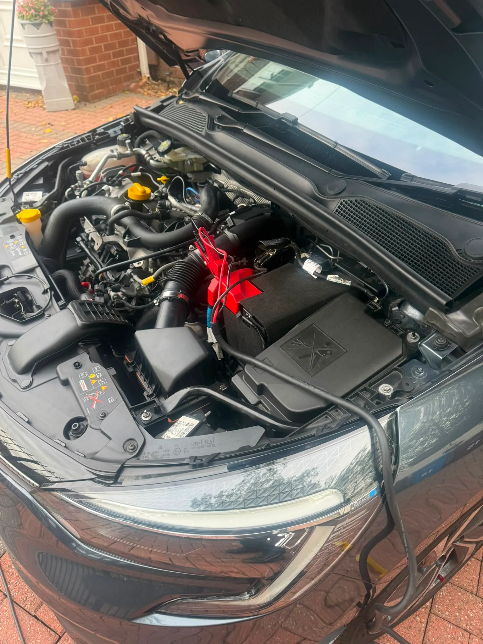 Renault Clio RS Line. Engine bay prepped, leads on the battery terminals.